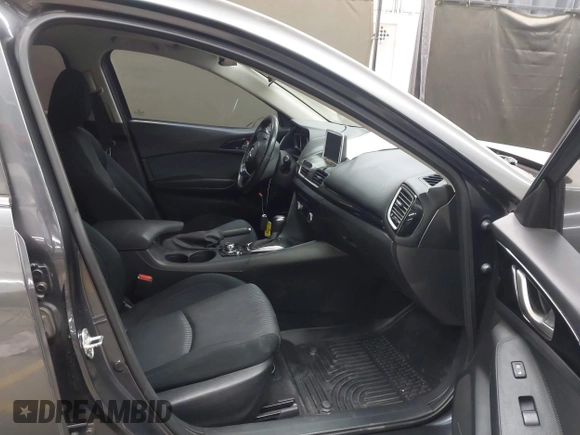 2015 Mazda 3 i Touring with VIN JM1BM1L75F1259985, listed as a IAAI auction lot 41067447 with 104,865 mi miles and . Bid and sale history available at carsss.com. Image 5.
