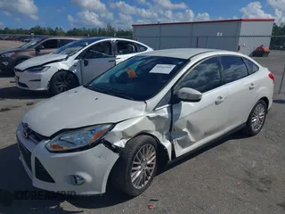 2012 Ford Focus SEL with VIN 1FAHP3H25CL282490, listed as a IAAI auction lot 40563360 with 223,864 mi miles and . Bid and sale history available at carsss.com. Image 2.