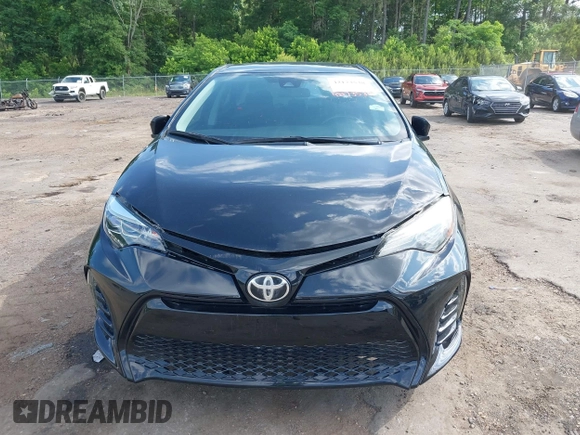 2019 Toyota Corolla L with VIN 5YFBURHE1KP923291, listed as a IAAI auction lot 42173538 with 60,184 mi miles and . Bid and sale history available at DreamBid. Image 12.