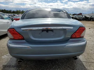 2005 Jaguar X-Type 3.0L with VIN SAJWA51AX5WE66748, listed as a Copart auction lot 49601374 with 129,709 mi miles and Salvage Title. Bid and sale history available at carsss.com. Image 6.
