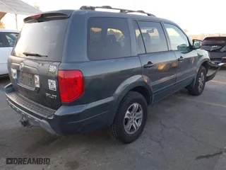 2005 Honda Pilot EX-L with NAVI with VIN 2HKYF187X5H514571, listed as a IAAI auction lot 41746538 with 276,994 mi miles. Bid and sale history available at carsss.com. Image 4.