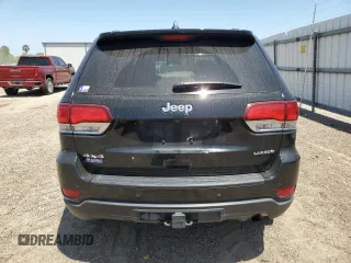 2021 Jeep Grand Cherokee Laredo E with VIN 1C4RJFAG8MC817661, listed as a Copart auction lot 52374235 with 25,305 mi miles and Salvage title. Bid and sale history available at DreamBid. Image 6.