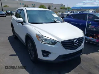 2016 Mazda CX-5 Grand Touring z VIN JM3KE2DY2G0824802, wystawiony jako IAAI lot #42170591 z przebiegiem 53 173 mil mil oraz . Historia ofert i sprzedaży dostępna na DreamBid. Obrazek 13.