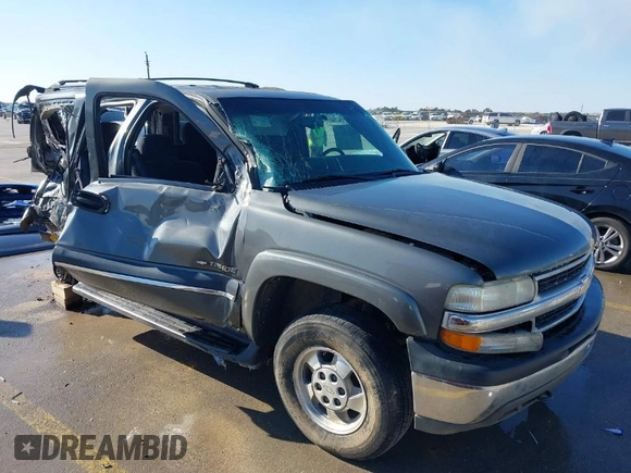 2002 Chevrolet Tahoe LT z VIN 1GNEC13Z42R319646, wystawiony jako IAAI lot #41623259 z przebiegiem 250 430 mil mil oraz . Historia ofert i sprzedaży dostępna na DreamBid. Obrazek 1.