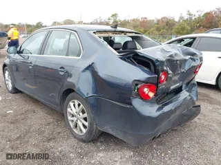 2010 Volkswagen Jetta Sedan Limited with VIN 3VWRX7AJ0AM009019, listed as a IAAI auction lot 41413050 with 164,752 mi miles. Bid and sale history available at carsss.com. Image 3.