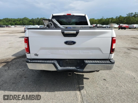 2018 Ford F-150 XL z VIN 1FTEX1CB1JKE34115, wystawiony jako Copart lot #59614915 z przebiegiem 58 265 mil mil oraz Szkoda całkowita • Salvage title. Historia ofert i sprzedaży dostępna na DreamBid. Obrazek 6.