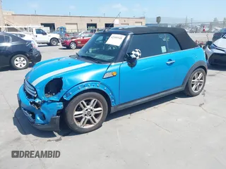 2014 MINI Convertible с VIN WMWZN3C55ET569656, выставлен на аукционе IAAI как лот 42105348 с пробегом 87 671 миль миль и . История ставок и продаж доступна на DreamBid. Изображение 18.