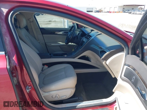 2016 Lincoln MKZ with VIN 3LN6L2GK2GR631195, listed as a IAAI auction lot 42001190 with 66,485 mi miles. Bid and sale history available at carsss.com. Image 5.