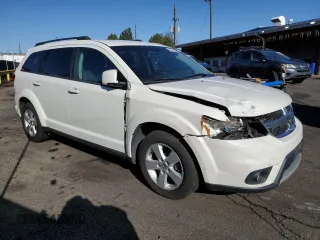 2012 Dodge Journey SXT z VIN 3C4PDCBG0CT364005, wystawiony jako Copart lot #55636265 z przebiegiem 150 048 mil mil oraz Szkoda całkowita • Salvage title. Historia ofert i sprzedaży dostępna na DreamBid. Obrazek 4.