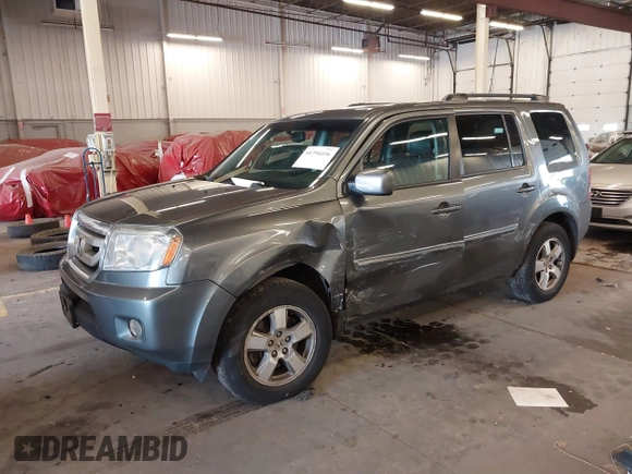 2011 Honda Pilot EX-L with VIN 5FNYF4H65BB020721, listed as a IAAI auction lot 41794436 with 113,630 mi miles and . Bid and sale history available at carsss.com. Image 2.