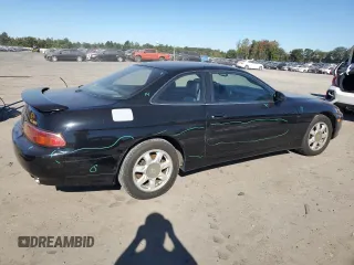1997 Lexus SC with VIN JT8CH32Y5V0052465, listed as a Copart auction lot 74328664 with 107,353 mi miles and Salvage Title. Bid and sale history available at carsss.com. Image 3.