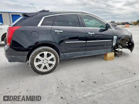 2016 Cadillac SRX Premium Collection with VIN 3GYFNDE35GS566884, listed as a Copart auction lot 62425985 with 27,133 mi miles and Salvage title. Bid and sale history available at DreamBid. Image 3.