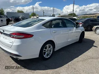 2018 Ford Fusion Hybrid SE with VIN 3FA6P0LU5JR173833, listed as a Copart auction lot 55092565 with 83,242 mi miles and Clean Title. Bid and sale history available at carsss.com. Image 4.