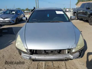 2003 Honda Accord LX with VIN 1HGCM72233A035334, listed as a IAAI auction lot 42098703 with 200,170 mi miles and . Bid and sale history available at DreamBid. Image 6.
