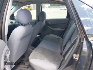 2004 Ford Focus SE z VIN 1FAFP34Z54W175689, wystawiony jako IAAI lot #42553615 z przebiegiem 188 652 mil mil oraz . Historia ofert i sprzedaży dostępna na DreamBid. Obrazek 8.