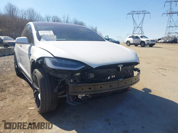 2018 Tesla Model X 75D with VIN 5YJXCAE45JF103828, listed as a IAAI auction lot 41698708 with 118,699 mi miles and . Bid and sale history available at carsss.com. Image 6.