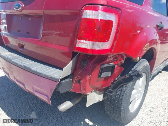 2010 Ford Escape XLT with VIN 1FMCU0D75AKB11394, listed as a IAAI auction lot 42037996 with 150,815 mi miles. Bid and sale history available at carsss.com. Image 6.