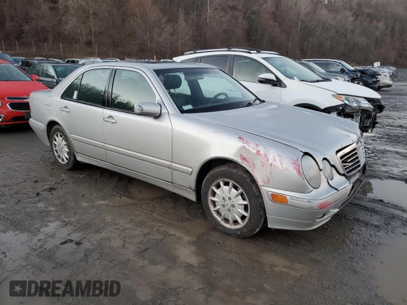 2002 Mercedes-Benz E-Class with VIN WDBJF82J32X066803, listed as a Copart auction lot 85474614 with 77,358 mi miles and Salvage Title. Bid and sale history available at carsss.com. Image 4.