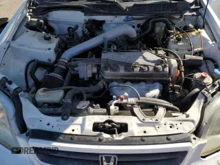 2000 Honda Civic DX z VIN 1HGEJ6225YL080394, wystawiony jako Copart lot #73515634 z przebiegiem 141 139 mil mil oraz Szkoda całkowita • Salvage title. Historia ofert i sprzedaży dostępna na DreamBid. Obrazek 11.