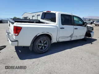 2015 Nissan Titan Pro-4X z VIN 1N6AA0EC9FN512658, wystawiony jako Copart lot #68066964 z przebiegiem 131 026 mil mil oraz Szkoda całkowita • Salvage title. Historia ofert i sprzedaży dostępna na DreamBid. Obrazek 3.
