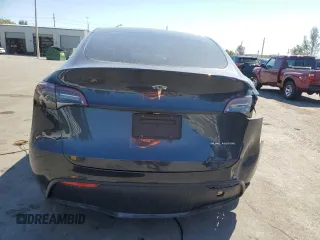 2024 Tesla Model Y Long Range с VIN 7SAYGDEE4RA243738, выставлен на аукционе Copart как лот 48953885 с пробегом Не указан миль и Списание • Salvage title. История ставок и продаж доступна на DreamBid. Изображение 6.