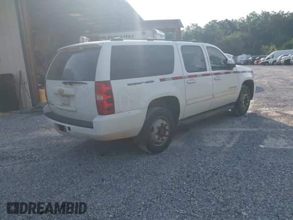2011 Chevrolet Suburban LS with VIN 1GNWKLEG2BR376507, listed as a IAAI auction lot 42590824 with 213,035 mi miles and . Bid and sale history available at DreamBid. Image 4.