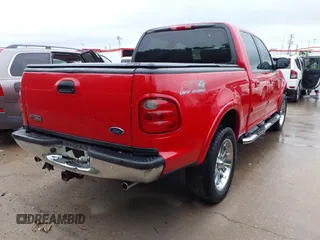 2003 Ford F-150 XLT with VIN 1FTRW08L63KA75640, listed as a IAAI auction lot 41952912 with 1 mi miles. Bid and sale history available at carsss.com. Image 4.