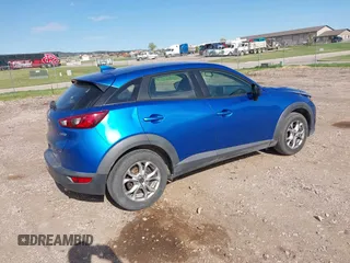 2016 Mazda CX-3 Sport z VIN JM1DKFB73G0140286, wystawiony jako IAAI lot #42235327 z przebiegiem 83 430 mil mil oraz . Historia ofert i sprzedaży dostępna na DreamBid. Obrazek 4.