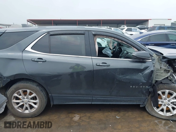 2018 Chevrolet Equinox LT z VIN 2GNAXSEV0J6272001, wystawiony jako IAAI lot #42185011 z przebiegiem 108 899 mil mil oraz . Historia ofert i sprzedaży dostępna na DreamBid. Obrazek 13.