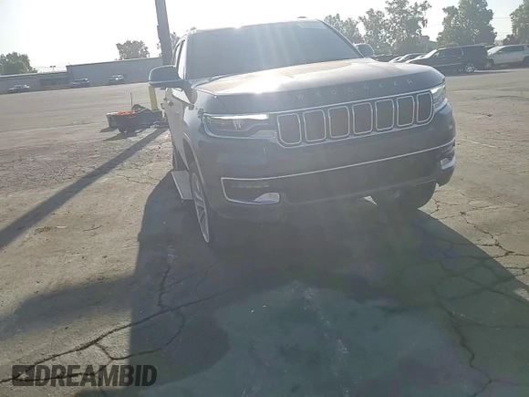 2022 Jeep Wagoneer Series III with VIN 1C4SJVDT5NS150897, listed as a Copart auction lot 61303065 with 80,148 mi miles and Salvage title. Bid and sale history available at DreamBid. Image 14.