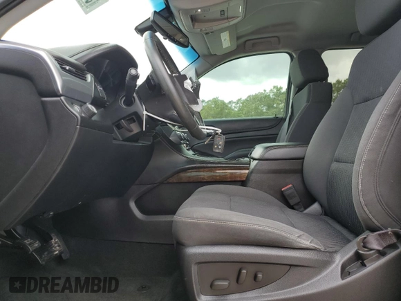 2015 Chevrolet Tahoe LS with VIN 1GNSCAKC4FR116004, listed as a Copart auction lot 54599375 with 87,645 mi miles and Salvage title. Bid and sale history available at DreamBid. Image 7.