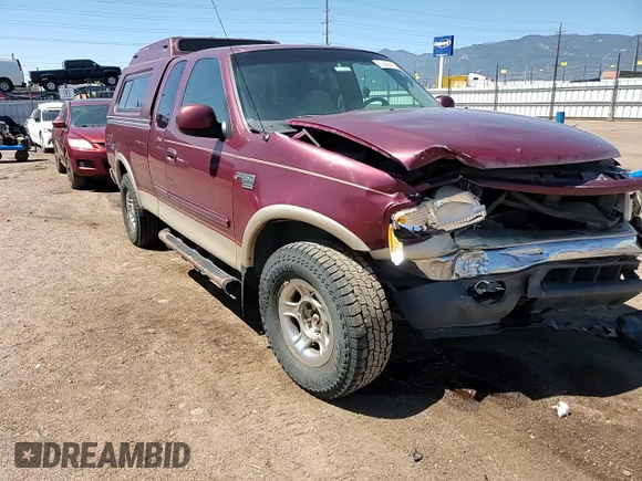 1999 Ford F-150 XL z VIN 1FTRX18LXXNB23891, wystawiony jako Copart lot #61445645 z przebiegiem 179 410 mil mil oraz Szkoda całkowita • Salvage title. Historia ofert i sprzedaży dostępna na DreamBid. Obrazek 13.