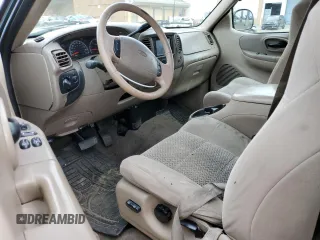 2003 Ford F-150 XL with VIN 1FTRX17L73KA47012, listed as a Copart auction lot 47410495 with 206,967 mi miles and Salvage title. Bid and sale history available at DreamBid. Image 8.