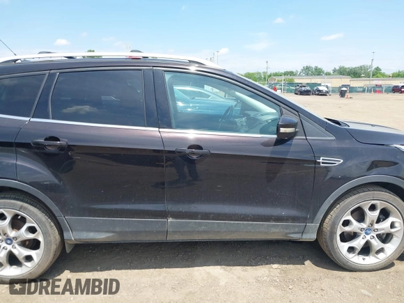 2013 Ford Escape Titanium с VIN 1FMCU9J9XDUC68731, выставлен на аукционе IAAI как лот 42285070 с пробегом 106 493 миль миль и . История ставок и продаж доступна на DreamBid. Изображение 13.
