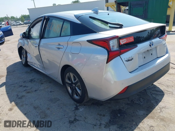 2021 Toyota Prius L Eco z VIN JTDKAMFU5M3137298, wystawiony jako IAAI lot #42270937 z przebiegiem 38 828 mil mil oraz . Historia ofert i sprzedaży dostępna na DreamBid. Obrazek 3.