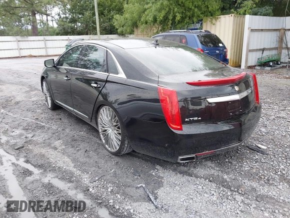 2014 Cadillac XTS Luxury z VIN 2G61N5S38E9292684, wystawiony jako IAAI lot #41842596 z przebiegiem 130 318 mil mil oraz . Historia ofert i sprzedaży dostępna na DreamBid. Obrazek 3.