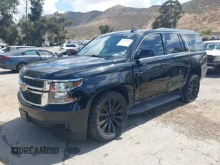 2018 Chevrolet Tahoe LS with VIN 1GNSCAKC9JR183853, listed as a IAAI auction lot 42254267 with 87,351 mi miles and . Bid and sale history available at DreamBid. Image 2.