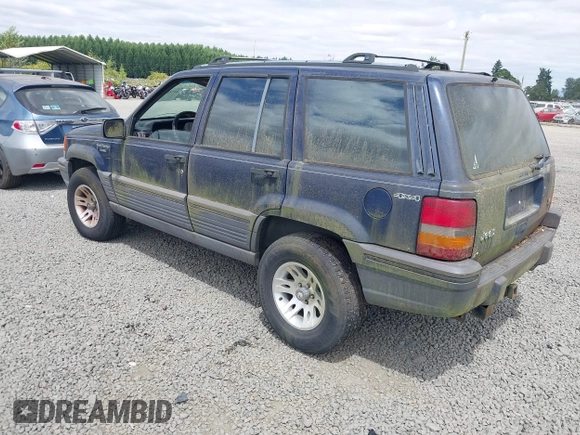 1994 Jeep Grand Cherokee Laredo z VIN 1J4GZ58Y2RC320793, wystawiony jako IAAI lot #42781115 z przebiegiem 275 518 mil mil oraz . Historia ofert i sprzedaży dostępna na DreamBid. Obrazek 3.
