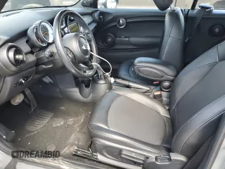 2016 MINI Convertible with VIN WMWWG5C57G3C19380, listed as a Copart auction lot 50645324 with 76,396 mi miles and Salvage title. Bid and sale history available at DreamBid. Image 7.