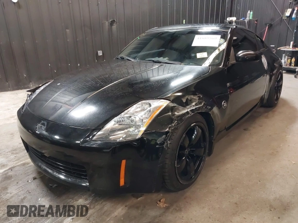 2005 Nissan 350Z Touring with VIN JN1AZ34E45M653631, listed as a IAAI auction lot 41689560 with 147,635 mi miles. Bid and sale history available at carsss.com. Image 18.