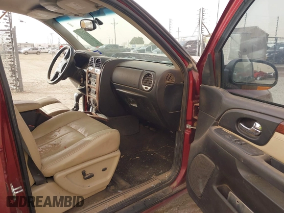 2007 GMC Envoy SLE with VIN 1GKDT13S972277907, listed as a IAAI auction lot 41367293 with 194,760 mi miles. Bid and sale history available at carsss.com. Image 5.