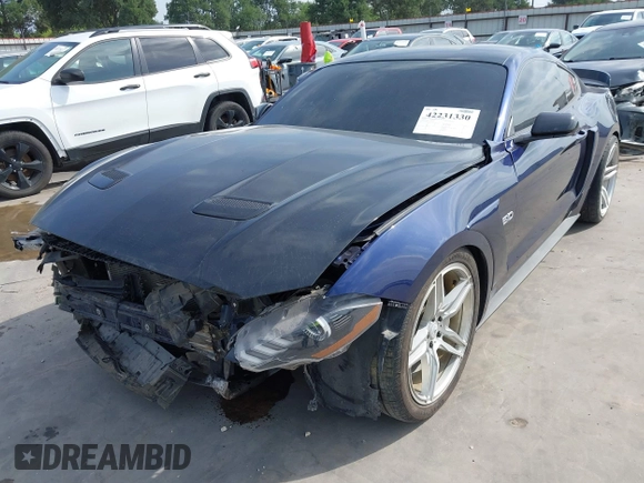 2018 Ford Mustang GT z VIN 1FA6P8CF7J5163016, wystawiony jako IAAI lot #42231330 z przebiegiem 55 810 mil mil oraz . Historia ofert i sprzedaży dostępna na DreamBid. Obrazek 22.