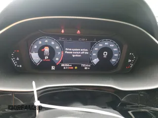 2019 Audi Q3 Premium z VIN WA1AECF32K1075590, wystawiony jako Copart lot #52745635 z przebiegiem 69 256 mil mil oraz Szkoda całkowita • Salvage title. Historia ofert i sprzedaży dostępna na DreamBid. Obrazek 9.