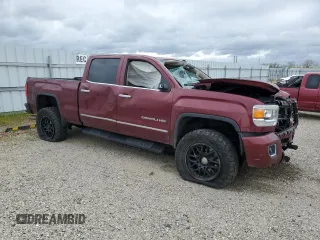 2015 GMC Sierra 2500HD Denali z VIN 1GT120E81FF157605, wystawiony jako Copart lot #48822405 z przebiegiem 135 338 mil mil oraz Szkoda całkowita • Salvage title. Historia ofert i sprzedaży dostępna na DreamBid. Obrazek 4.