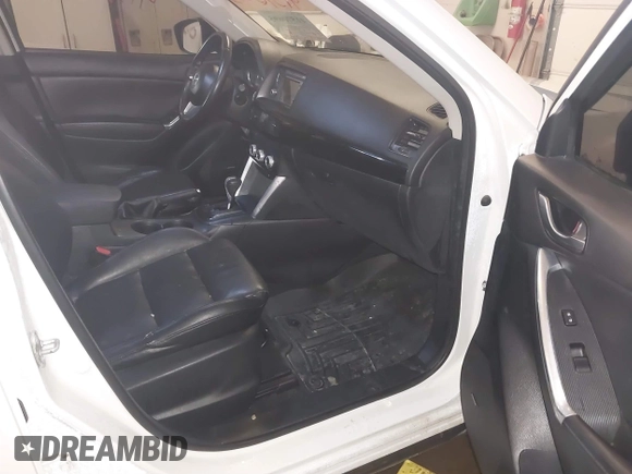 2013 Mazda CX-5 Grand Touring with VIN JM3KE4DE8D0147851, listed as a IAAI auction lot 41570695 with 94,648 mi miles. Bid and sale history available at carsss.com. Image 5.