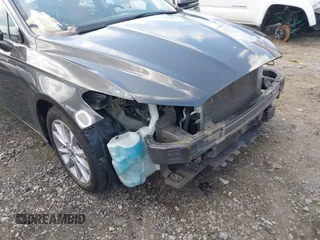 2017 Ford Fusion Hybrid SE z VIN 3FA6P0LU3HR260558, wystawiony jako IAAI lot #42657176 z przebiegiem 161 183 mil mil oraz . Historia ofert i sprzedaży dostępna na DreamBid. Obrazek 19.
