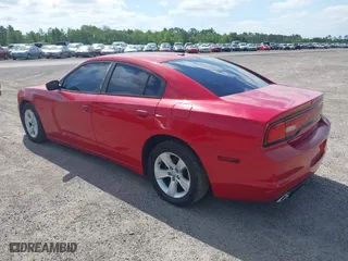 2012 Dodge Charger SXT with VIN 2C3CDXHG7CH267734, listed as a IAAI auction lot 41449921 with 170,724 mi miles. Bid and sale history available at carsss.com. Image 3.
