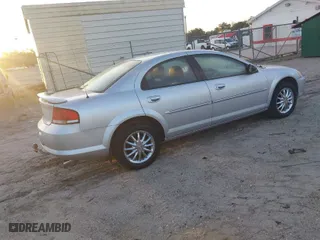 2002 Chrysler Sebring Sdn Touring with VIN 1C3AL56R32N100084, listed as a IAAI auction lot 41941075 with 145,187 mi miles. Bid and sale history available at carsss.com. Image 4.