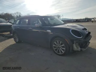 2016 MINI Cooper Clubman S with VIN WMWLN9C57G2B31788, listed as a Copart auction lot 82565434 with 121,977 mi miles and Salvage Title. Bid and sale history available at carsss.com. Image 4.