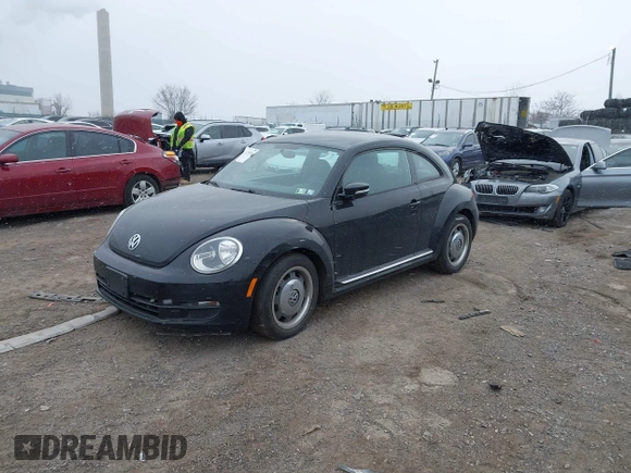 2012 Volkswagen Beetle 2.5L PZEV with VIN 3VWJP7AT0CM628169, listed as a IAAI auction lot 41628754 with 64,770 mi miles and . Bid and sale history available at DreamBid. Image 17.